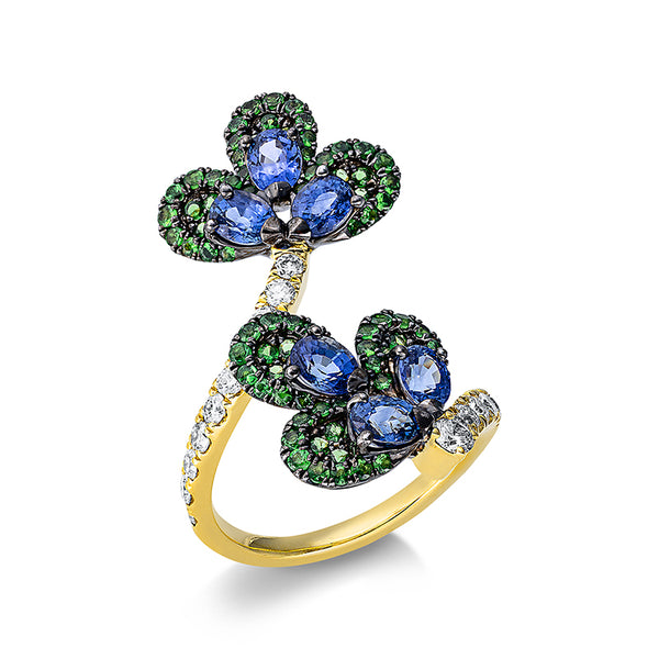 Ring 18 kt GG Blumen. Fassung teils schwarz rhodinie