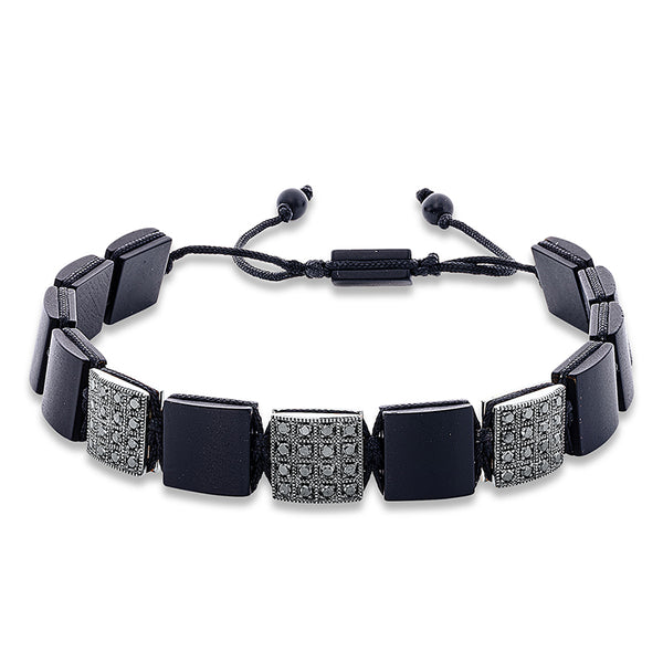 Armband 18 kt WG. black cord strap